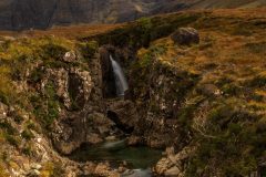 Fairy Pools at sunrise in the Isle of Skye. Transform your space with breathtaking Scottish Highlands landscape photography.