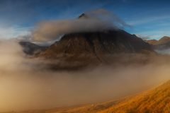 Buachaille Etive Mòr at sunrise. Experience the enchanting landscapes of the Scottish Highlands today!