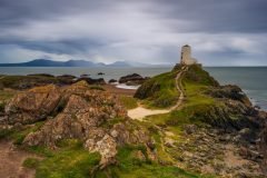 Twr Mawr Lighthouse with breathtaking sunsets over Snowdonia.